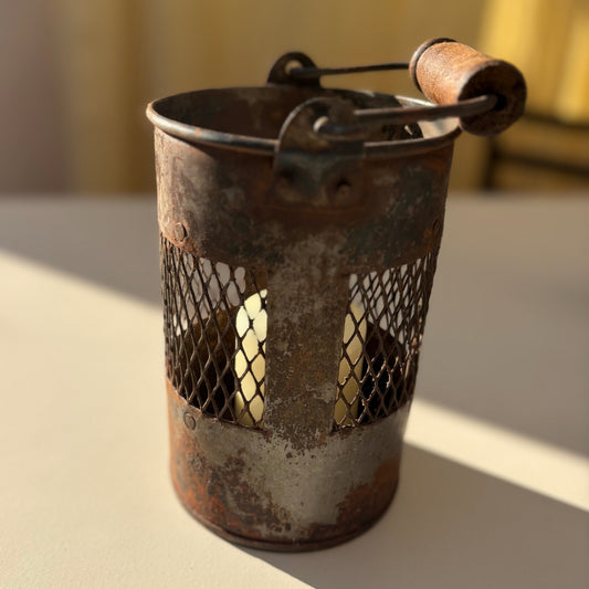 Iron candle holder