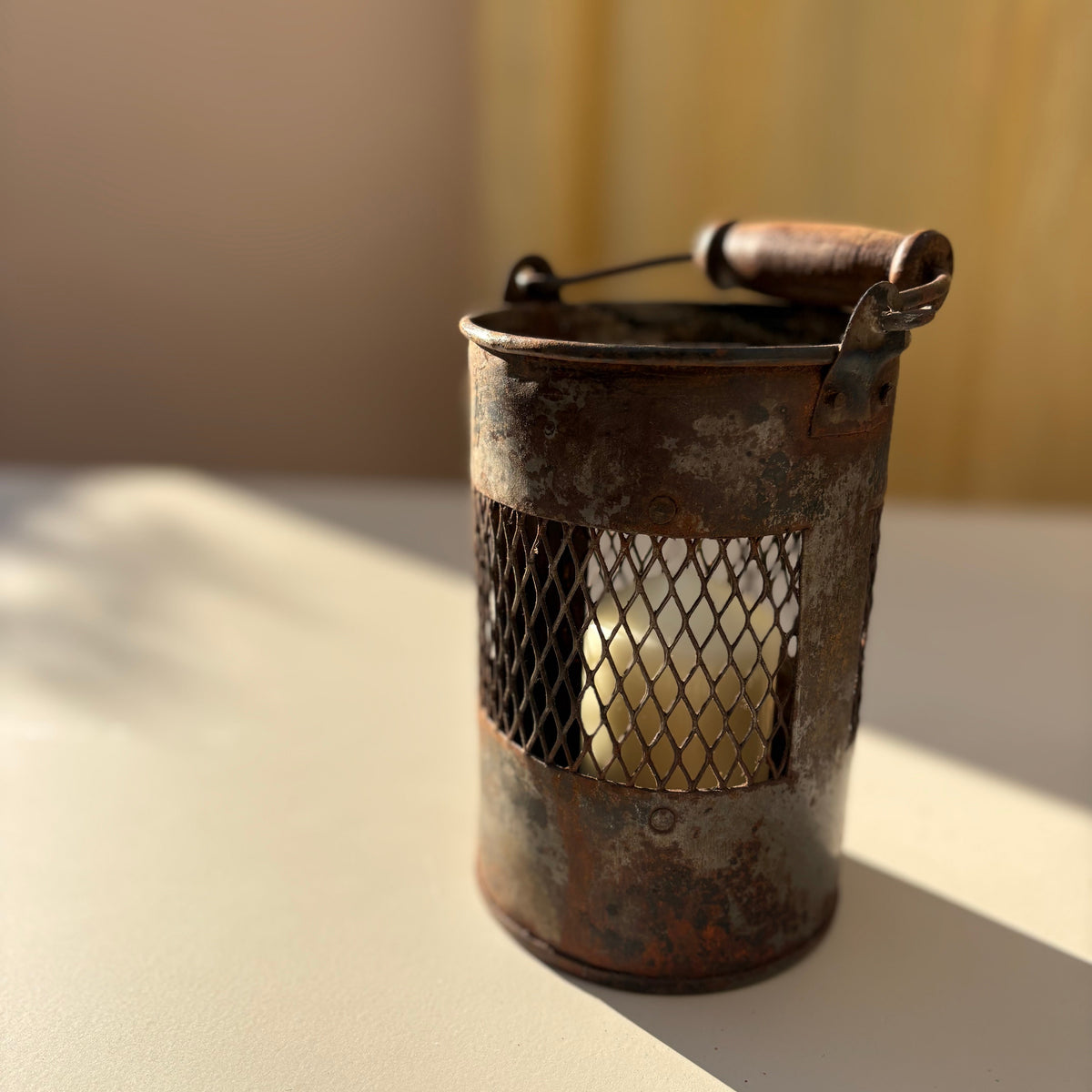 Iron candle holder